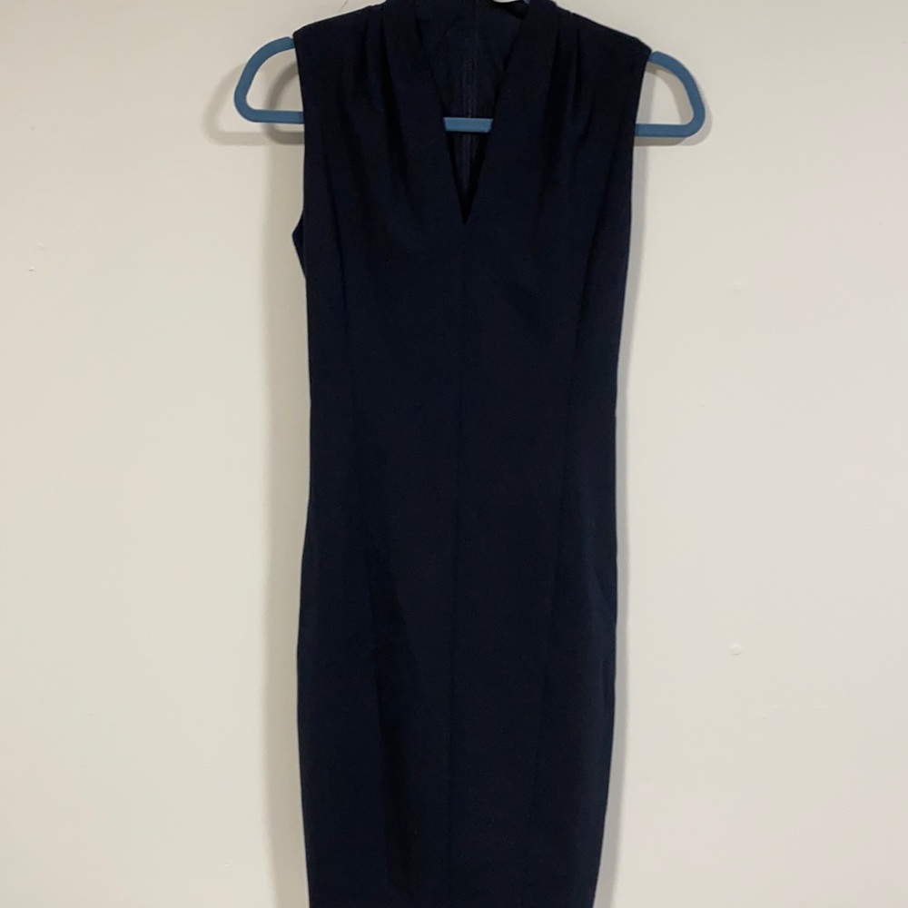 Women’s Tahari black dress size 4. Open v neck